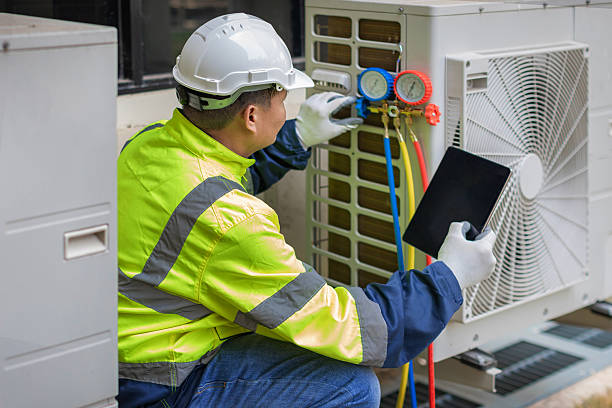 Professional Hvac technician working in Norwood, MA
